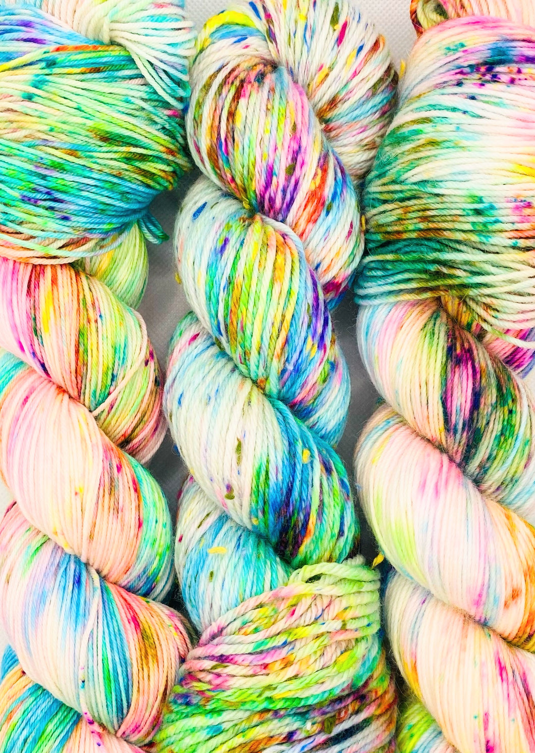 “Sun Dappled Coral” Hand Dyed Yarn