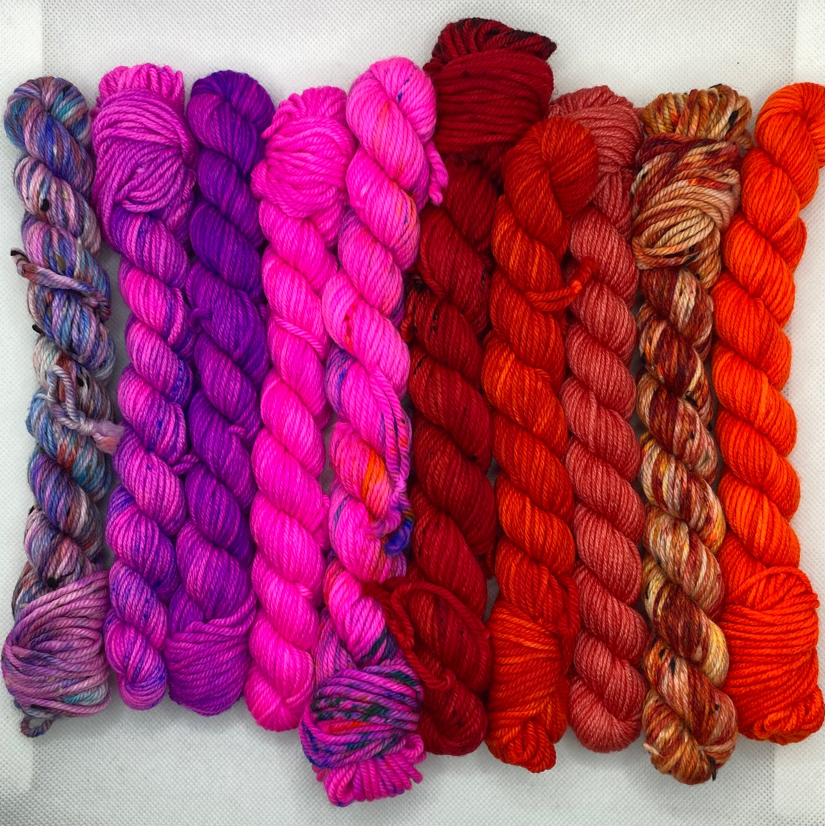 “Oranges, Pinks and Purples” DK Mini Skein Set of Hand Dyed Yarn